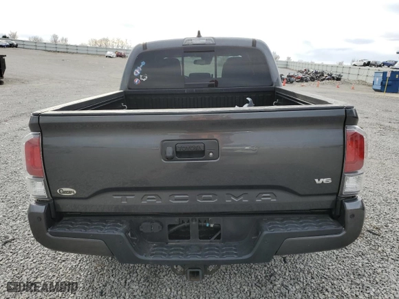 2021 Toyota Tacoma 4WD SR with VIN 3TMCZ5AN3MM422826, listed as a Copart auction lot 50305865 with 74,876 mi miles and Salvage Title. Bid and sale history available at carsss.com. Image 6.