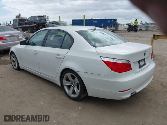 2009 BMW 5 Series 528i with VIN WBANU53529C121927, listed as a IAAI auction lot 42063066 with 195,322 mi miles and . Bid and sale history available at carsss.com. Image 3.