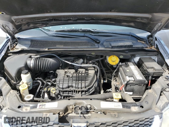 2014 Dodge Grand Caravan SE 30th Anniversary with VIN 2C4RDGBG6ER361826, listed as a Copart auction lot 55062375 with 135,990 mi miles and Clean Title. Bid and sale history available at DreamBid. Image 12.