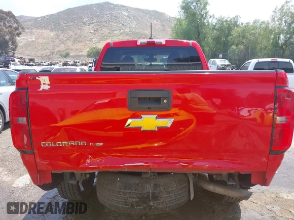 2019 Chevrolet Colorado 2WD Work Truck with VIN 1GCHSBEN3K1100815, listed as a IAAI auction lot 42127659 with Not Provided miles and . Bid and sale history available at DreamBid. Image 17.