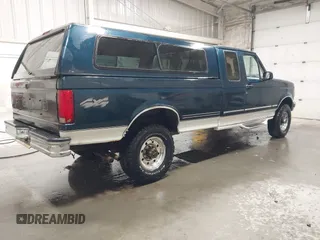 1997 Ford F-250 HD with VIN 1FTHX26G0VEB12354, listed as a IAAI auction lot 42033876 with Not Provided miles. Bid and sale history available at carsss.com. Image 4.