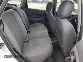 2004 Ford Focus with VIN 3FAFP37Z94R101447, listed as a Copart auction lot 74570054 with 162,166 mi miles and Salvage title. Bid and sale history available at DreamBid. Image 10.
