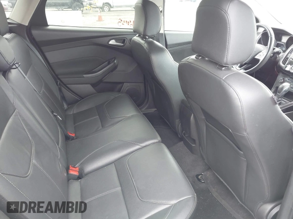 2017 Ford Focus Titanium with VIN 1FADP3N2XHL230766, listed as a IAAI auction lot 42386275 with 64,138 mi miles and . Bid and sale history available at DreamBid. Image 8.