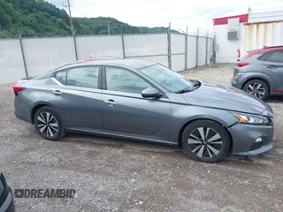 2021 Nissan Altima 2.5 SV with VIN 1N4BL4DV0MN329261, listed as a IAAI auction lot 39970665 with 70,287 mi miles. Bid and sale history available at carsss.com. Image 13.