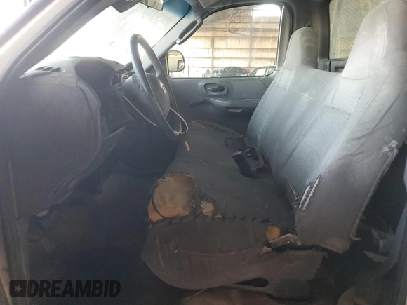 2003 Ford F-150 XL with VIN 1FTRF17W43NA46900, listed as a Copart auction lot 76247114 with 295,546 mi miles and Salvage Title. Bid and sale history available at DreamBid. Image 7.