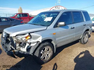 2006 Honda Pilot LX with VIN 2HKYF18156H556689, listed as a IAAI auction lot 40792236 with 273,856 mi miles. Bid and sale history available at carsss.com. Image 18.