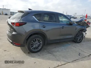 2021 Mazda CX-5 Touring with VIN JM3KFACM9M0330485, listed as a Copart auction lot 44622895 with Not Provided miles and Salvage Title. Bid and sale history available at DreamBid. Image 3.