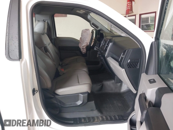 2020 Ford F-150 XL with VIN 1FTMF1C59LFC62890, listed as a IAAI auction lot 42430422 with 68,809 mi miles and . Bid and sale history available at DreamBid. Image 5.