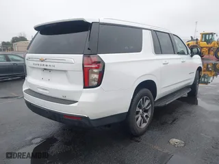 2021 Chevrolet Suburban LT with VIN 1GNSCCKD2MR150654, listed as a IAAI auction lot 41529412 with 36,479 mi miles. Bid and sale history available at carsss.com. Image 4.