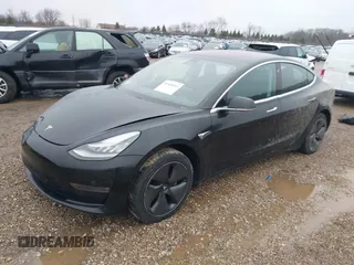 2018 Tesla Model 3 Long Range Battery with VIN 5YJ3E1EB1JF127289, listed as a IAAI auction lot 41484253 with 60,577 mi miles and . Bid and sale history available at DreamBid. Image 17.