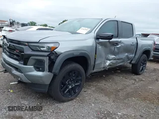 2024 Chevrolet Colorado 4WD Z71 with VIN 1GCPTDEK0R1310857, listed as a IAAI auction lot 42412552 with 11,628 mi miles and . Bid and sale history available at DreamBid. Image 2.