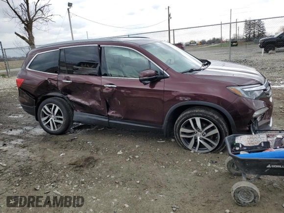 2017 Honda Pilot Touring with VIN 5FNYF6H95HB007885, listed as a Copart auction lot 50945215 with 118,699 mi miles and Clean Title. Bid and sale history available at DreamBid. Image 4.