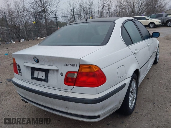 2000 BMW 3 Series 328i with VIN WBAAM5341YFR20178, listed as a IAAI auction lot 41477979 with 151,328 mi miles. Bid and sale history available at carsss.com. Image 4.