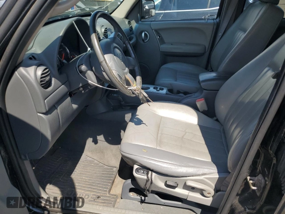 2005 Jeep Liberty Limited with VIN 1J8GL58K05W711624, listed as a Copart auction lot 62479315 with 138,904 mi miles and Salvage title. Bid and sale history available at DreamBid. Image 7.