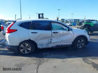 2019 Honda CR-V LX with VIN 2HKRW5H39KH410755, listed as a IAAI auction lot 41729389 with 52,396 mi miles. Bid and sale history available at carsss.com. Image 13.