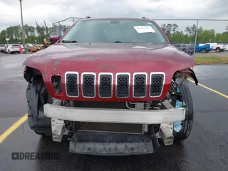 2019 Jeep Cherokee Latitude Plus with VIN 1C4PJMLB2KD104856, listed as a IAAI auction lot 42097709 with 89,552 mi miles and . Bid and sale history available at DreamBid. Image 13.