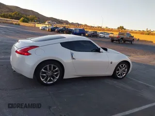 2014 Nissan 370Z Touring с VIN JN1AZ4EH2EM635420, выставлен на аукционе IAAI как лот 40862653 с пробегом 68 004 миль миль и . История ставок и продаж доступна на DreamBid. Изображение 13.