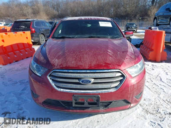 2015 Ford Taurus SEL z VIN 1FAHP2E85FG163421, wystawiony jako IAAI lot #41320489 z przebiegiem 165 618 mil mil oraz . Historia ofert i sprzedaży dostępna na DreamBid. Obrazek 12.