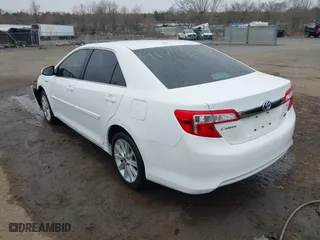 2014 Toyota Camry Hybrid LE with VIN 4T1BD1FK1EU102768, listed as a IAAI auction lot 41793746 with 157,015 mi miles. Bid and sale history available at carsss.com. Image 3.