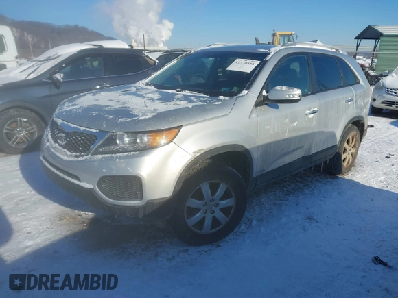 2013 Kia Sorento LX with VIN 5XYKTDA20DG385289, listed as a IAAI auction lot 41370458 with 107,216 mi miles and . Bid and sale history available at DreamBid. Image 2.