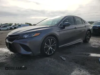 2019 Toyota Camry Hybrid LE z VIN 4T1B21HKXKU518106, wystawiony jako Copart lot #77074883 z przebiegiem 147 442 mil mil oraz Szkoda całkowita • Salvage title. Historia ofert i sprzedaży dostępna na DreamBid. Obrazek 1.