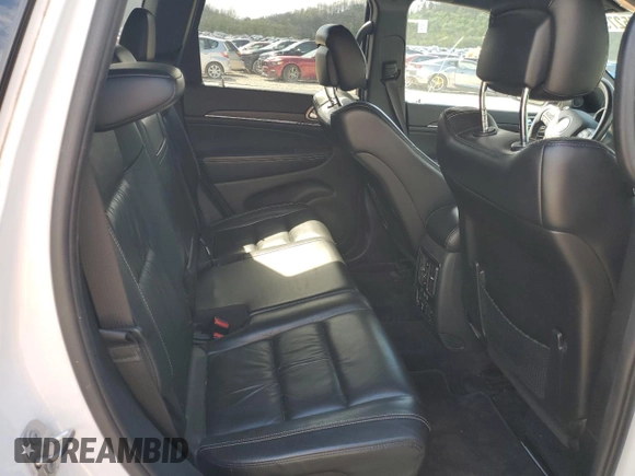 2016 Jeep Grand Cherokee Limited 75th Anniversary with VIN 1C4RJFBT6GC436472, listed as a Copart auction lot 53052795 with 223,570 mi miles and Salvage Title. Bid and sale history available at DreamBid. Image 11.