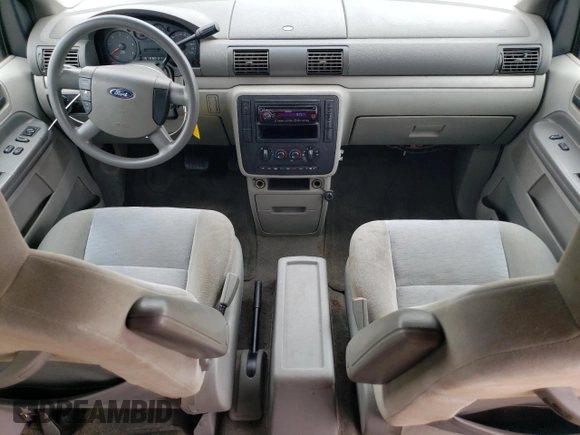 2005 Ford Freestar SE с VIN 2FMZA51615BA67146, выставлен на аукционе Copart как лот 71000634 с пробегом 84 096 миль миль и Списание • Salvage title. История ставок и продаж доступна на DreamBid. Изображение 8.