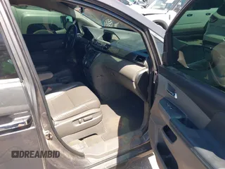 2015 Honda Odyssey Touring Elite with VIN 5FNRL5H98FB034700, listed as a IAAI auction lot 42019265 with 226,829 mi miles and . Bid and sale history available at DreamBid. Image 5.