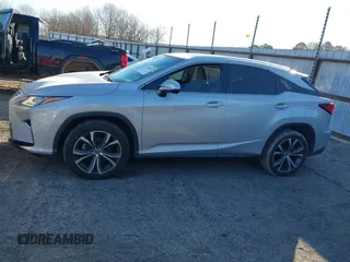 2018 Lexus RX 350 z VIN 2T2ZZMCA6JC096728, wystawiony jako IAAI lot #41356629 z przebiegiem 76 982 mil mil oraz . Historia ofert i sprzedaży dostępna na DreamBid. Obrazek 14.