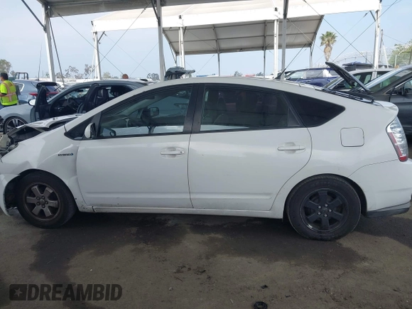 2008 Toyota Prius z VIN JTDKB20U483454957, wystawiony jako IAAI lot #42358477 z przebiegiem 256 781 mil mil oraz . Historia ofert i sprzedaży dostępna na DreamBid. Obrazek 15.