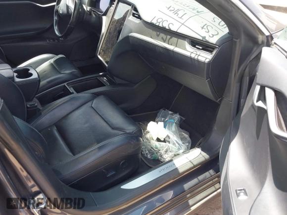 2018 Tesla Model S 75D with VIN 5YJSA1E43JF260547, listed as a IAAI auction lot 42346240 with 89,637 mi miles and . Bid and sale history available at DreamBid. Image 5.