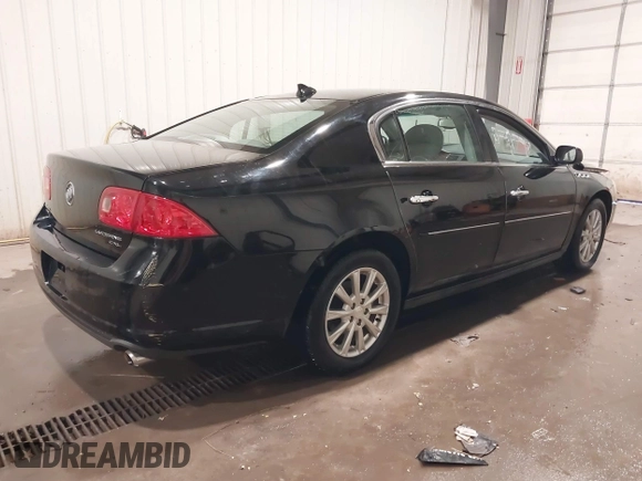 2011 Buick Lucerne CXL with VIN 1G4HC5EM7BU112210, listed as a IAAI auction lot 41502729 with 123,047 mi miles and . Bid and sale history available at carsss.com. Image 4.