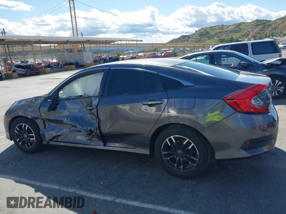 2016 Honda Civic Sedan LX with VIN 19XFC2F51GE034644, listed as a IAAI auction lot 41939884 with 59,433 mi miles. Bid and sale history available at carsss.com. Image 13.