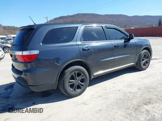 2013 Dodge Durango SXT with VIN 1C4RDJAG2DC530407, listed as a IAAI auction lot 41837441 with 133,375 mi miles and . Bid and sale history available at DreamBid. Image 4.