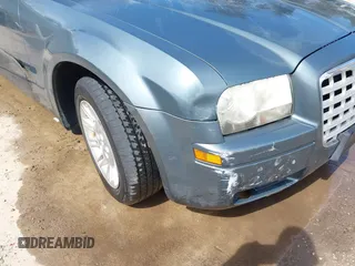2005 Chrysler 300 with VIN 2C3JA43R45H616682, listed as a IAAI auction lot 41853835 with 158,464 mi miles. Bid and sale history available at carsss.com. Image 17.