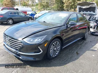2022 Hyundai Sonata Hybrid SEL with VIN KMHL34JJ9NA045924, listed as a IAAI auction lot 41918996 with 86,081 mi miles. Bid and sale history available at carsss.com. Image 2.