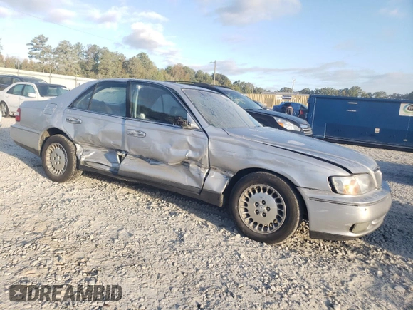 1998 Infiniti Q45 z VIN JNKBY31A9WM400536, wystawiony jako Copart lot #77225484 z przebiegiem 136 342 mil mil oraz Szkody całkowita. Historia ofert i sprzedaży dostępna na DreamBid. Obrazek 4.