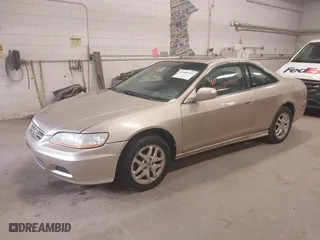 2001 Honda Accord Cpe EX w/Leather with VIN 1HGCG22571A004377, listed as a IAAI auction lot 42080485 with 1 mi miles. Bid and sale history available at carsss.com. Image 2.