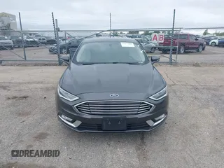 2017 Ford Fusion Energi SE with VIN 3FA6P0PU9HR227932, listed as a IAAI auction lot 42177500 with 106,938 mi miles. Bid and sale history available at carsss.com. Image 12.