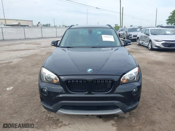 2014 BMW X1 sDrive28i with VIN WBAVM1C54EVW46561, listed as a IAAI auction lot 41880387 with 125,096 mi miles. Bid and sale history available at carsss.com. Image 12.