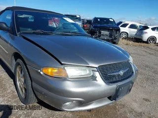1999 Chrysler Sebring JXi with VIN 3C3EL55H8XT571486, listed as a IAAI auction lot 40755184 with 163,286 mi miles and . Bid and sale history available at DreamBid. Image 6.
