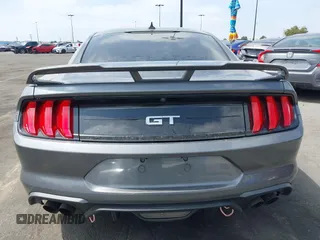 2021 Ford Mustang GT z VIN 1FA6P8CF0M5104894, wystawiony jako IAAI lot #41903098 z przebiegiem 38 794 mil mil oraz . Historia ofert i sprzedaży dostępna na DreamBid. Obrazek 17.