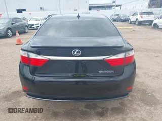 2014 Lexus ES 300h with VIN JTHBW1GG3E2049722, listed as a IAAI auction lot 42163826 with 165,656 mi miles and . Bid and sale history available at DreamBid. Image 16.