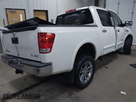 2014 Nissan Titan S with VIN 1N6AA0EC1EN504617, listed as a IAAI auction lot 41633861 with 65,047 mi miles. Bid and sale history available at carsss.com. Image 4.