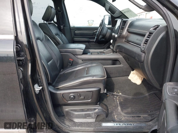 2023 Ram 1500 Limited with VIN 1C6SRFHT2PN541975, listed as a IAAI auction lot 41930788 with Not provided miles and . Bid and sale history available at DreamBid. Image 5.