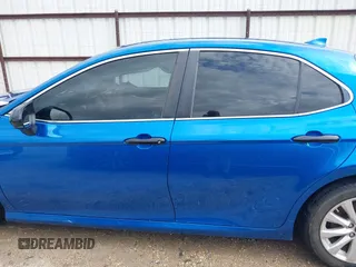 2019 Toyota Camry LE with VIN 4T1B11HK7KU259920, listed as a IAAI auction lot 42115493 with 69,254 mi miles and . Bid and sale history available at DreamBid. Image 14.