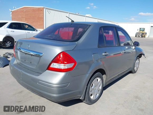 2010 Nissan Versa S with VIN 3N1BC1AP2AL394996, listed as a IAAI auction lot 40690760 with 125,972 mi miles and . Bid and sale history available at DreamBid. Image 4.