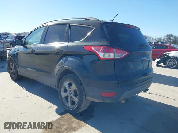 2016 Ford Escape SE with VIN 1FMCU0G99GUC19883, listed as a IAAI auction lot 41726858 with 156,863 mi miles. Bid and sale history available at carsss.com. Image 3.