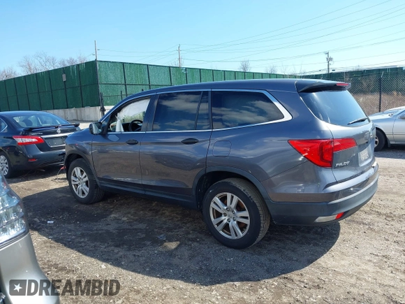 2016 Honda Pilot LX with VIN 5FNYF6H14GB082537, listed as a IAAI auction lot 41864525 with 137,097 mi miles. Bid and sale history available at carsss.com. Image 15.