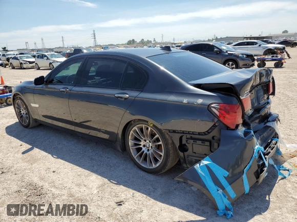 2015 BMW 7 Series 740Li xDrive with VIN WBAYF4C58FGS99363, listed as a Copart auction lot 69837154 with 115,101 mi miles and Salvage Title. Bid and sale history available at carsss.com. Image 2.